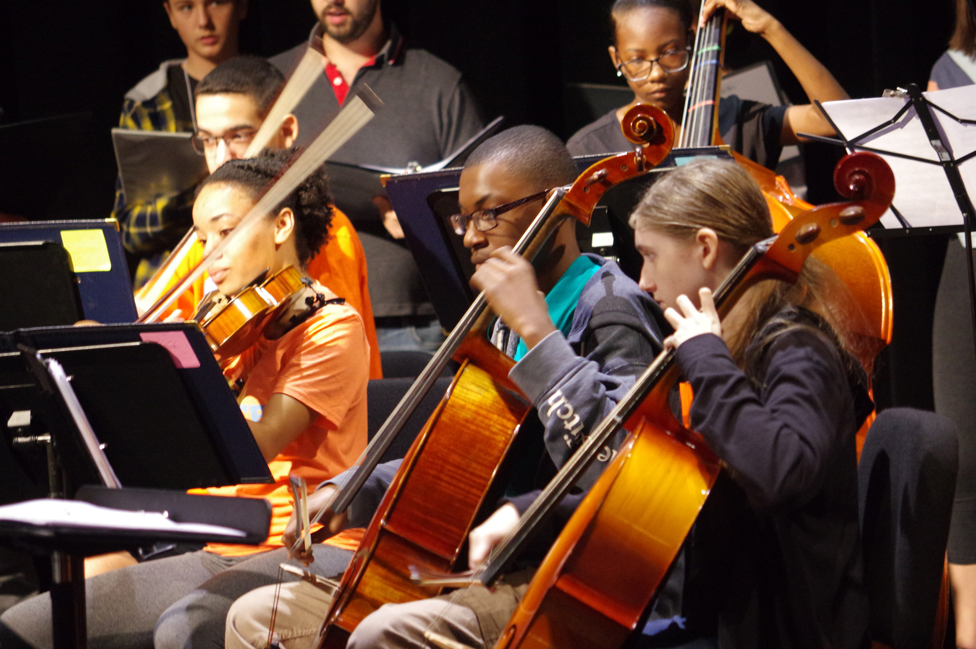 Patel students playing musical instruments.