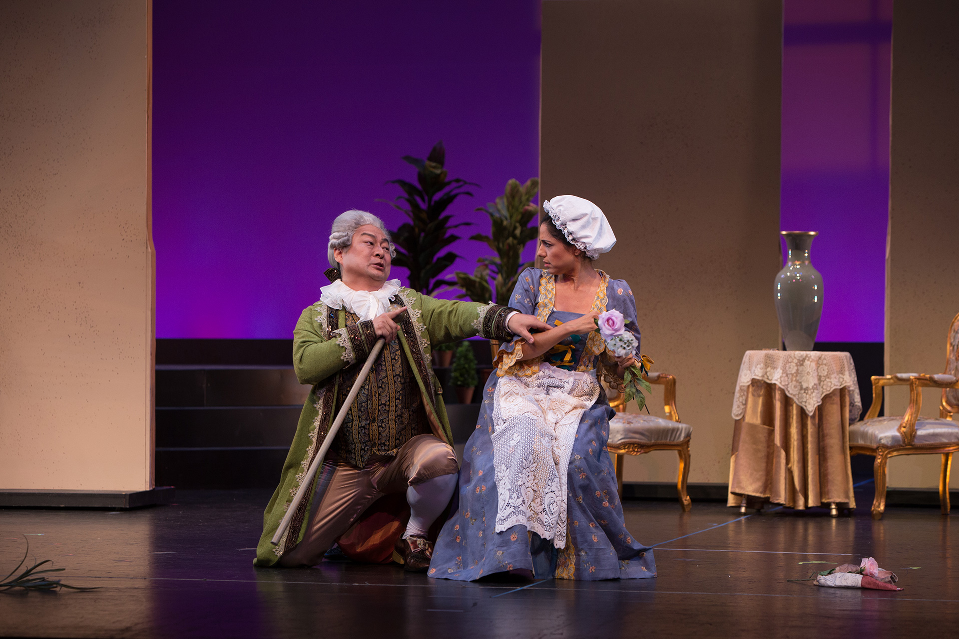 a male and female actor performing on stage