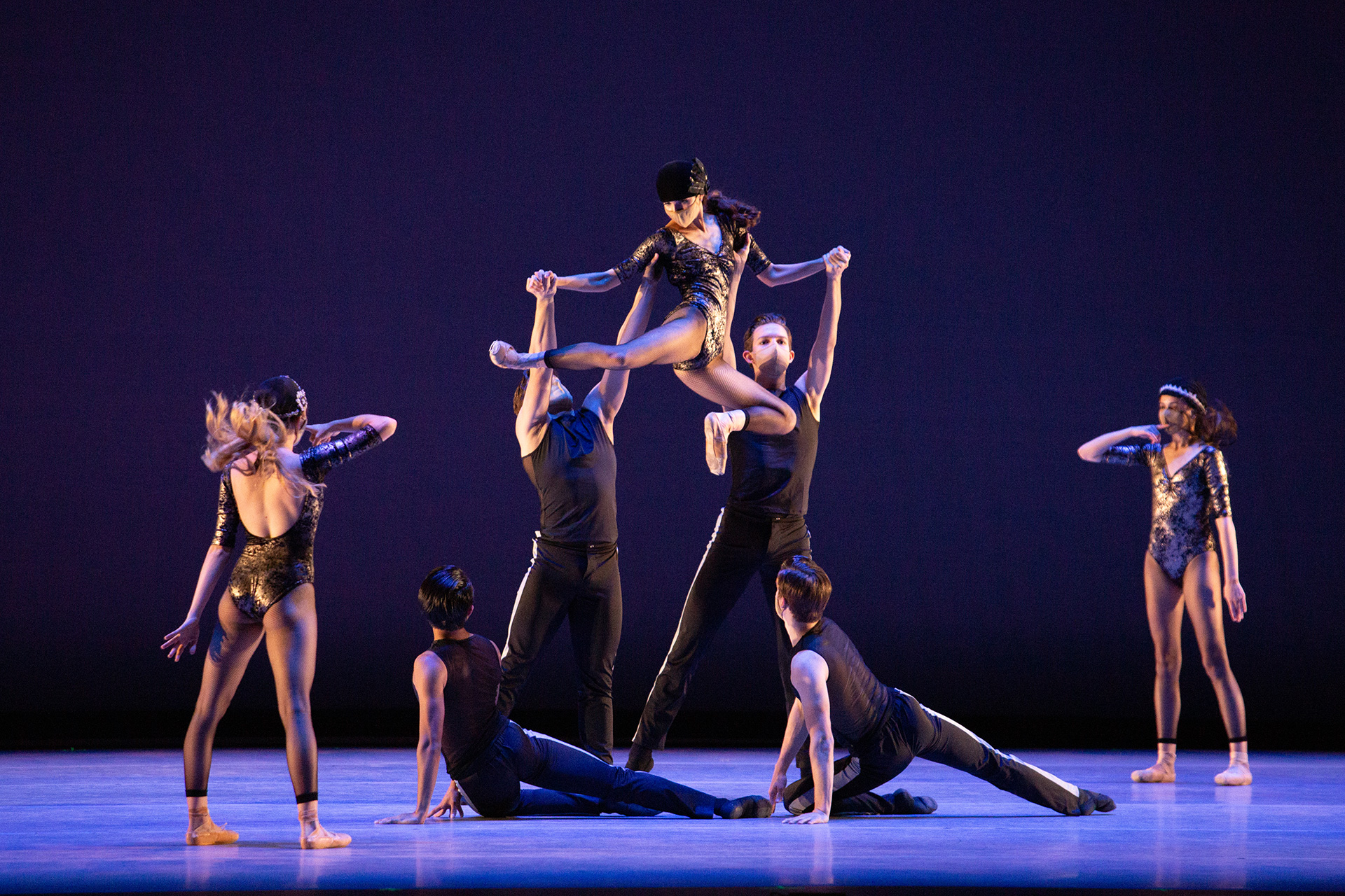 NGB students performing ballet on stage.