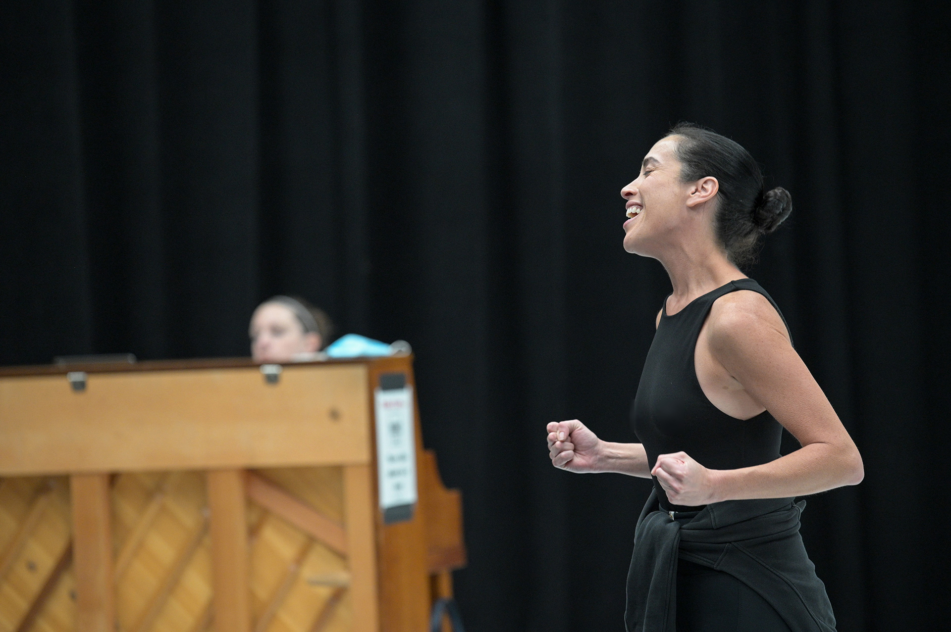 Patel student singing with a piano being played in the background.